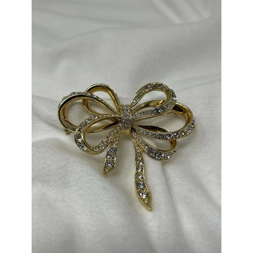 Vintage KJL For Avon Bow Pin Brooch Crystal Gold Tone Kenneth Jay Lane 2 3/4 In.